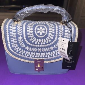 Brand New Baby Blue ALDO crochet design satchel.